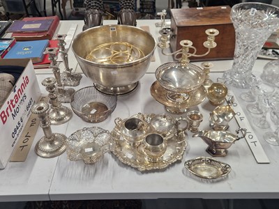Lot 934 - Electroplate: a punch bowl, candlesticks, a...
