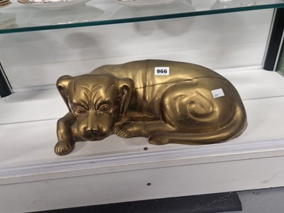 Lot 966 - A brass figure of a reclining dog