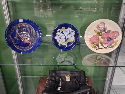 Lot 972 - A Walter Moorcroft dragon slip trailed dish...