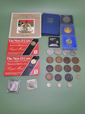 Lot 1110 - A collection of coins to include two 1983...