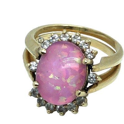 Lot 1117 - A vintage day and night ring set, either side...