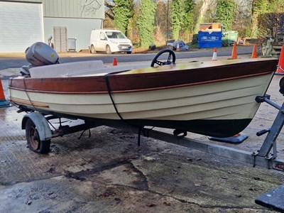 Lot 1265 - A vintage motorboat on trailer with a Honda...