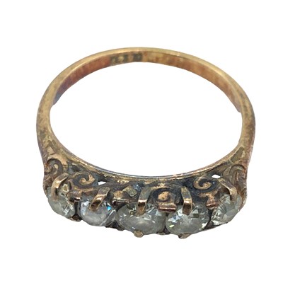 Lot 1121 - A five-stone graduated old cut diamond ring....