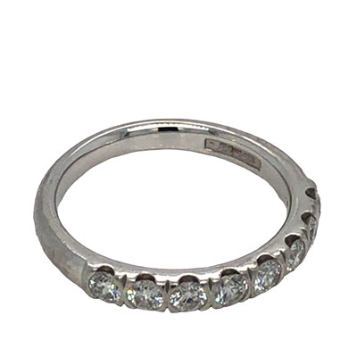 Lot 1123 - A platinum hallmarked and diamond wedding...