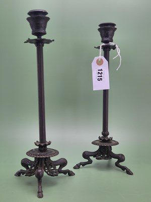 Lot 1215 - A pair of Barbedienne bronze candlesticks,...