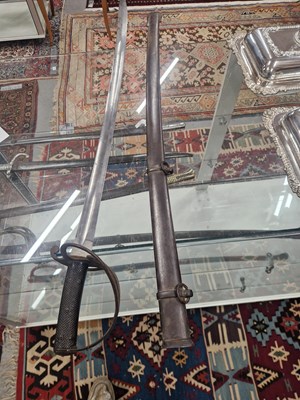 Lot 1282 - A cavalry sword in an iron scabbard
