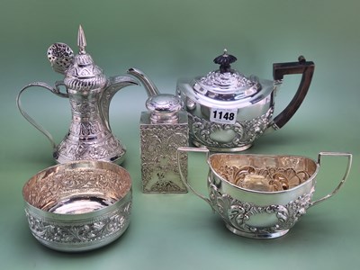 Lot 1148 - A silver tea pot and matching two handled...