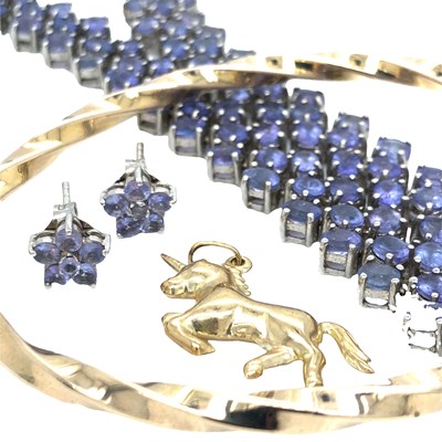 Lot 1130 - A 9ct hallmarked gold twisted bangle, and a...