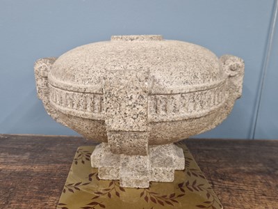 Lot 1317 - A carved granite finial. Diameter 43cms. Base...