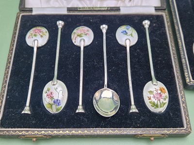 Lot 1131 - A cased set of six hallmarked and enamel...