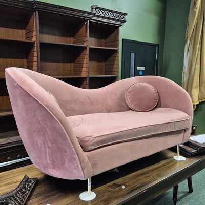 Lot 474 - A modern pink upholstered sofa. H 82 W 162 D 80cm