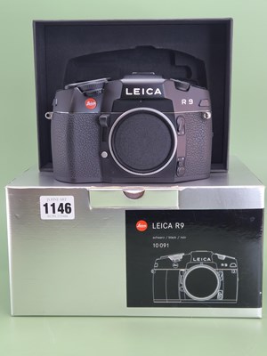 Lot 1146 - A Leica R9 camera boxed with its paperwork