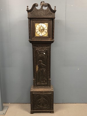Lot 1219 - A 19th century bog oak long cased clock, the...