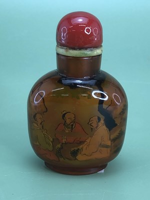 Lot 1223 - A Chinese interior decorated amber glass snuff...