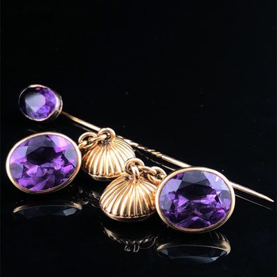 Lot 1011 - An amethyst set Gemtlemans suite. Comprising a...