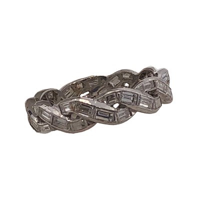 Lot 1013 - An unhallmarked platinum and diamond woven...