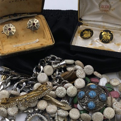 Lot 1020 - A heavy silver id bracelet, marks rubbed, and...