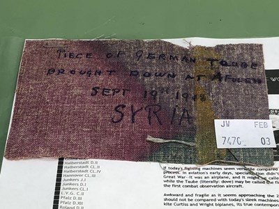 Lot 1240 - A piece of material from a Taube aeroplane...