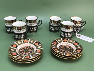Lot 1248 - A set of six Crown Derby 1128 pattern coffee...