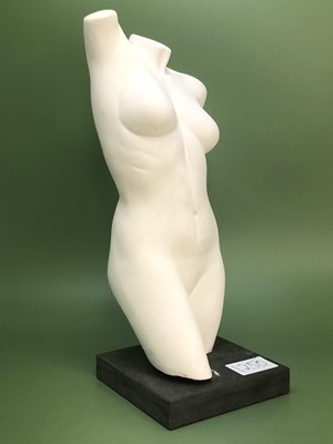 Lot 1250 - A white composition female nude torso mounted...