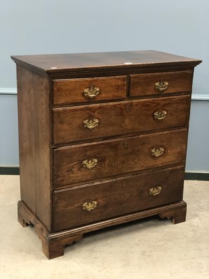 Lot 1269 - A George III oak chest of two short and three...