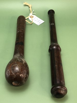 Lot 1284 - A rosewood truncheon decorated with a crown...