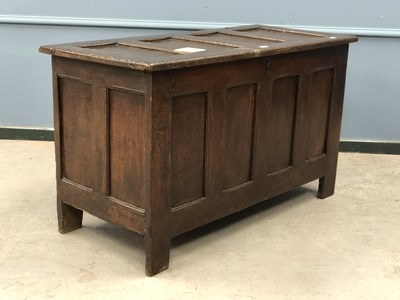 Lot 1301 - An 18th century oak coffer with a four...