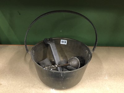 Lot 512 - A brass jam pan, a hearth brush and a pair of...