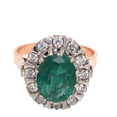 Lot 1054 - A 14ct rose and white gold cluster ring set...