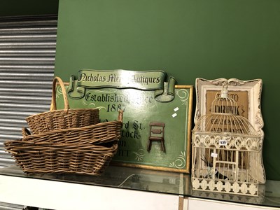 Lot 535 - A Nicholas Merry Antiques sign, three baskets,...