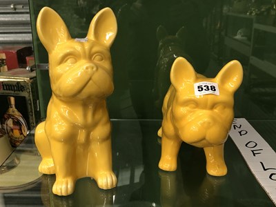 Lot 538 - Two yellow glazed French Bulldog figures