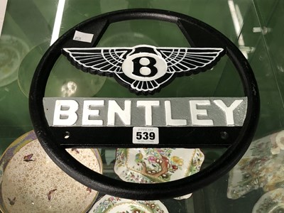 Lot 539 - A painted metal Bentley roundel
