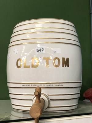 Lot 542 - A white pottery barrel with the gilt label...
