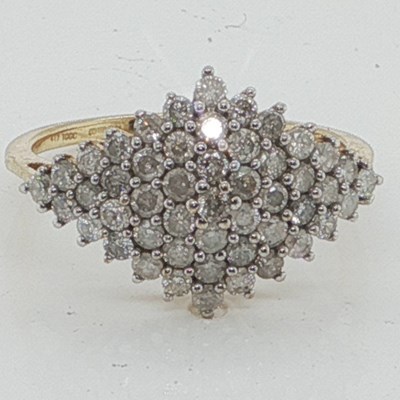 Lot 1084 - A 9ct hallmarked gold multi-diamond set...