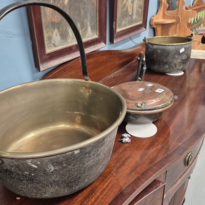 Lot 16 - A copper warming pan and two brass pans