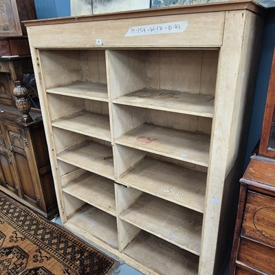 Lot 31 - An antique pine open front larder cupboard or...