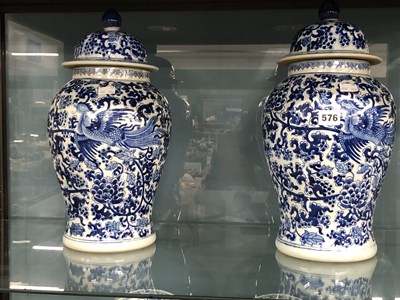 Lot 576 - A pair of Chinese blue and white baluster jars...