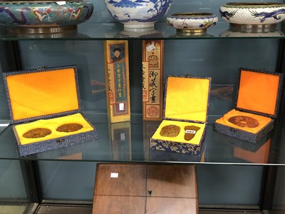 Lot 582 - Cased Chinese hardstone bi and other ornaments