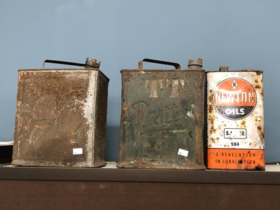 Lot 584 - A Newton Oils and two other fuel cans