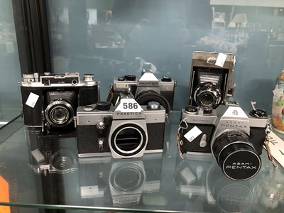 Lot 586 - Five cameras by Praktica, Pentax and Ross