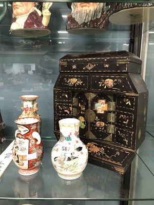 Lot 587 - A Japanese mother of pearl inlaid black...