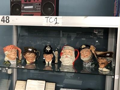 Lot 626 - Six Doulton character jugs