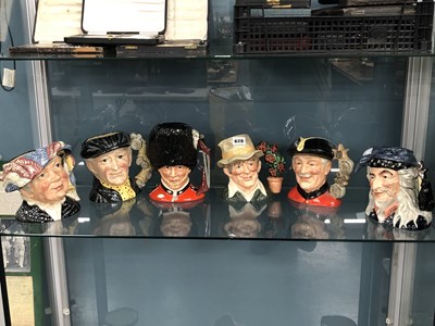 Lot 628 - Six Doulton character jugs