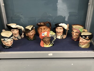 Lot 629 - Eight Doulton character jugs