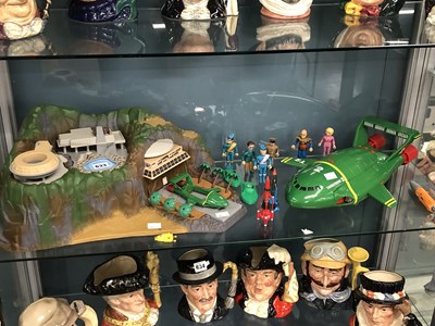 Lot 633 - A Thunderbirds model of Tracy Island together...