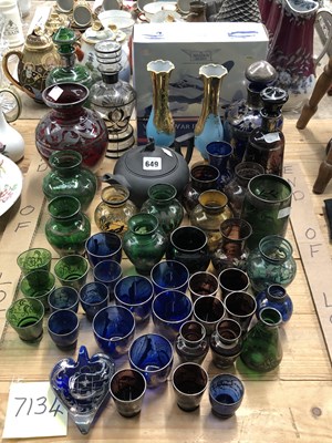 Lot 649 - A collection of silvered coloured glass:...