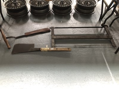Lot 653 - A chopper, a saw and thatcher's blade