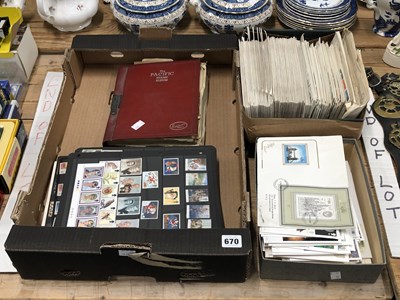 Lot 670 - First day covers together with a stamp album...
