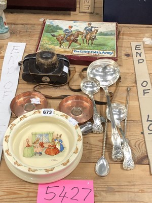 Lot 673 - Electroplate ladles, a Doulton child's bowl, a...