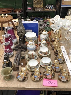 Lot 677 - A Benin bronze head, Japanese eggshell tea and...